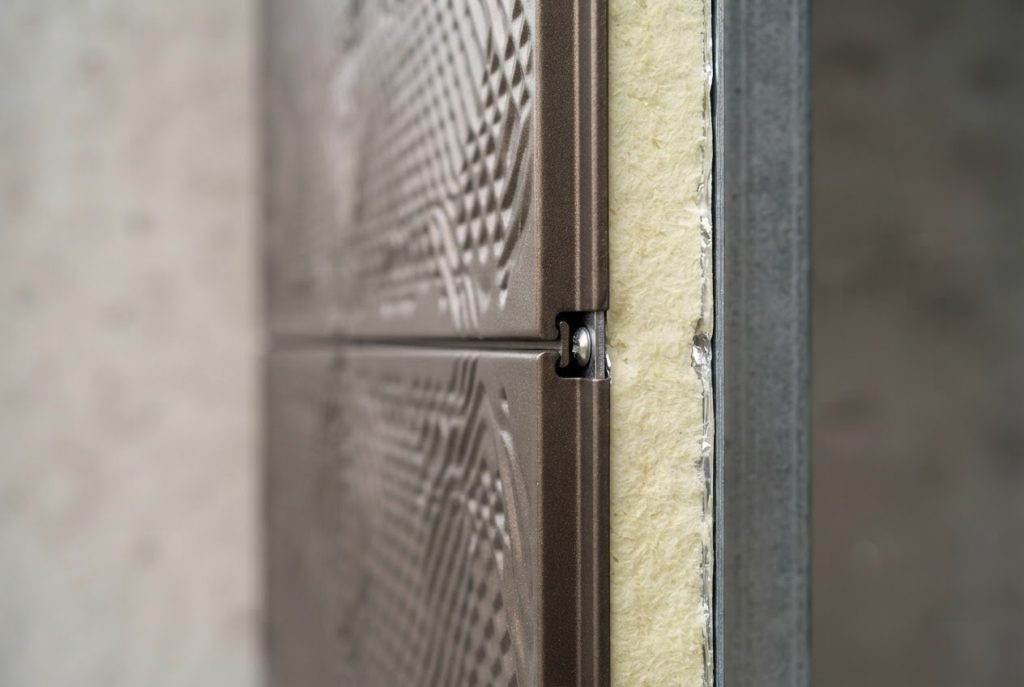Close-up texture of premium metal carved insulated wall panel